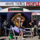 People mount a portrait of Emmett Till at George Floyd Square on June 3, 2021, in Minneapolis, Minnesota